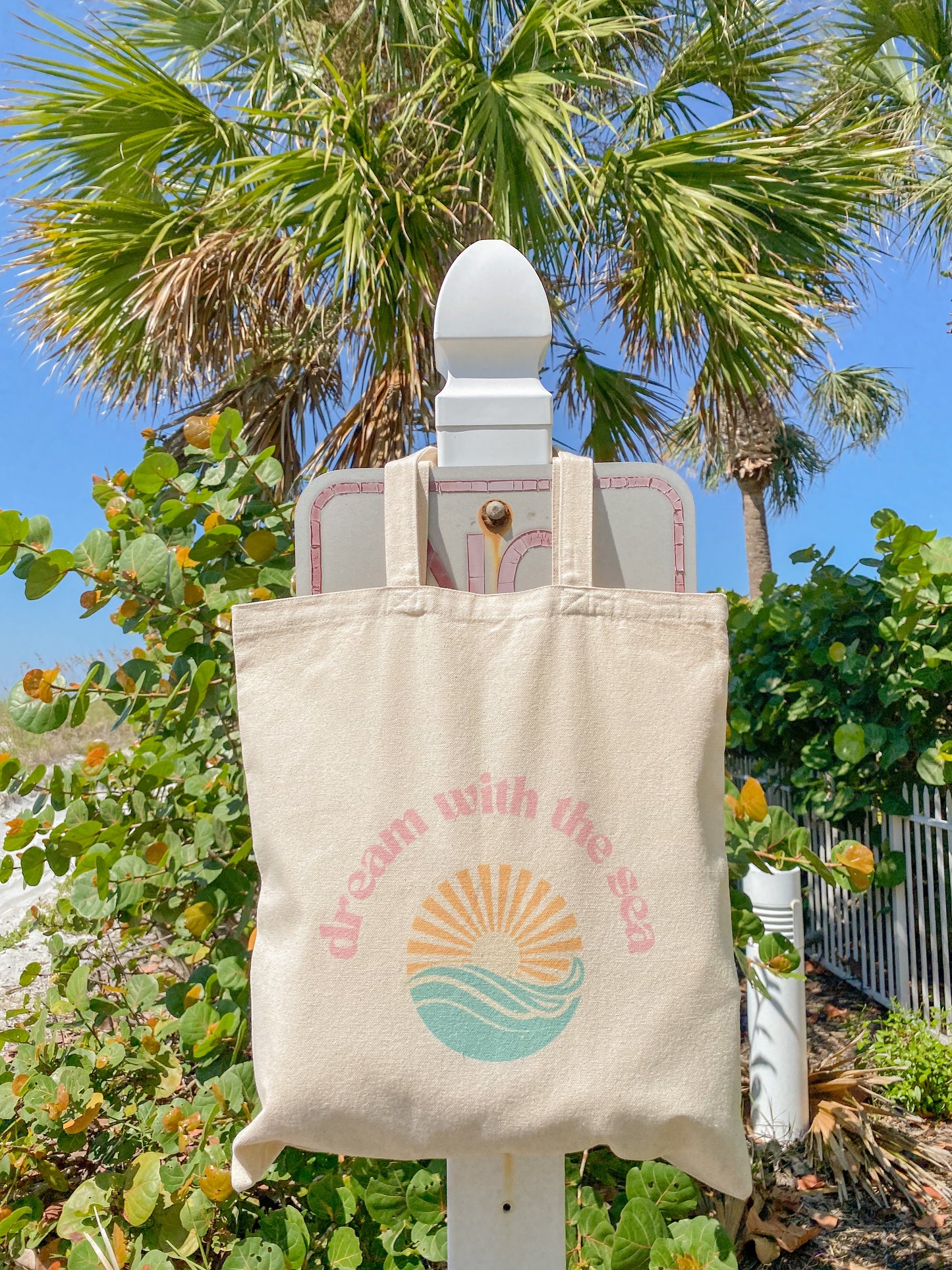 dream with the sea tote bag